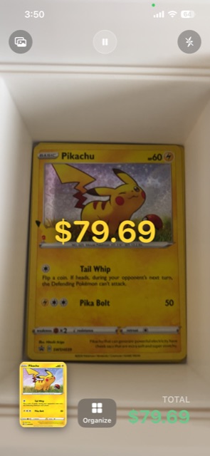 Scan 'Em All camera scan showing a Pikachu card priced at $79.69